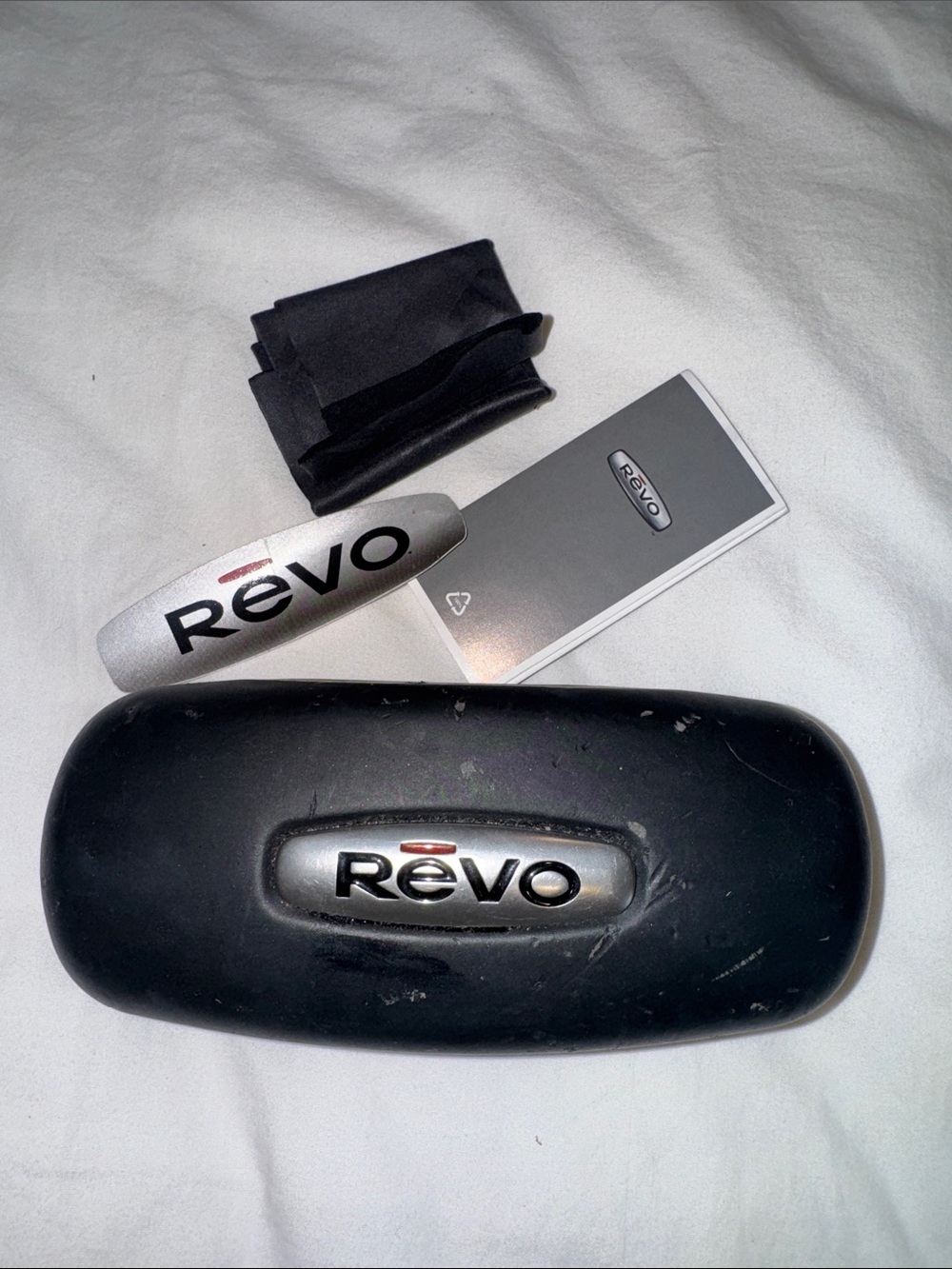 Revo Black and Silver Sunglasses Case with Cloth and Booklet - Picture 3 of 3
